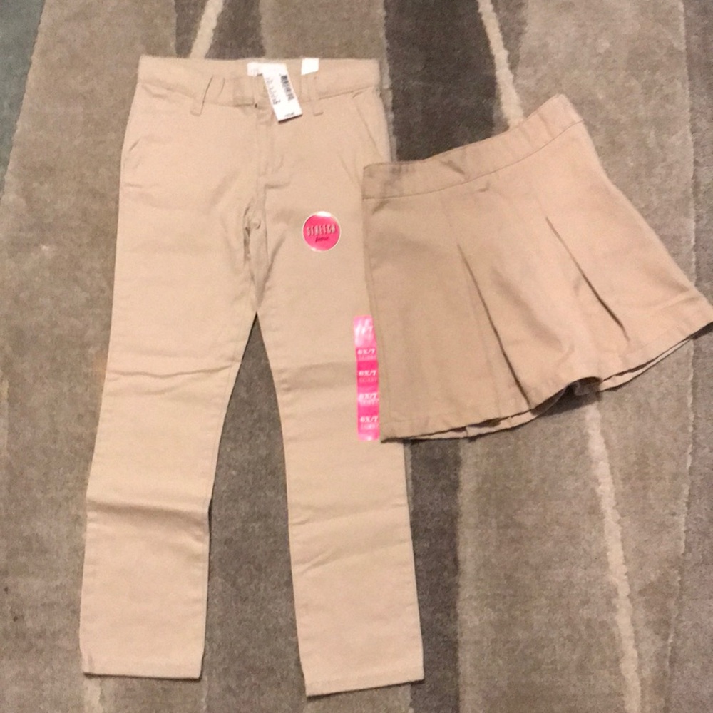 Lot of 2 school uniform bottoms.